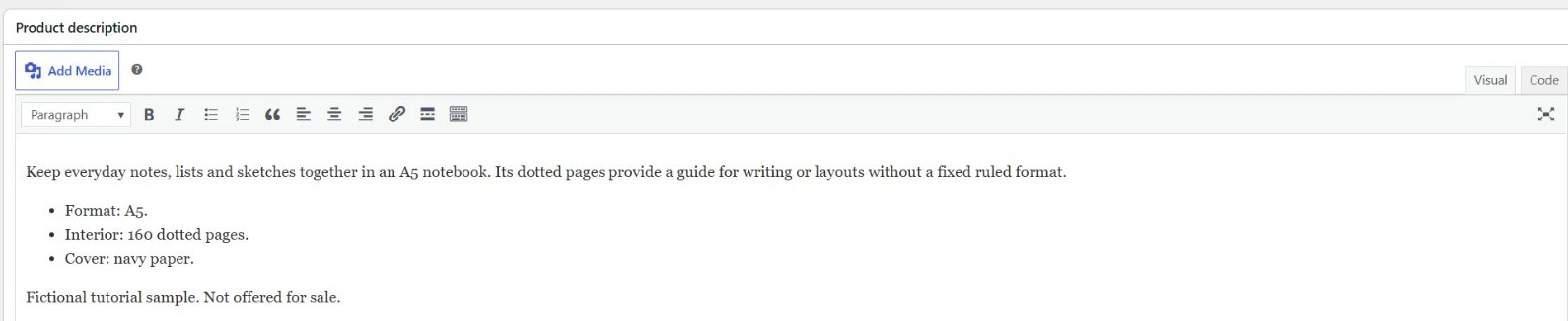 Focused native WooCommerce editor showing the saved notebook description and formatting controls.